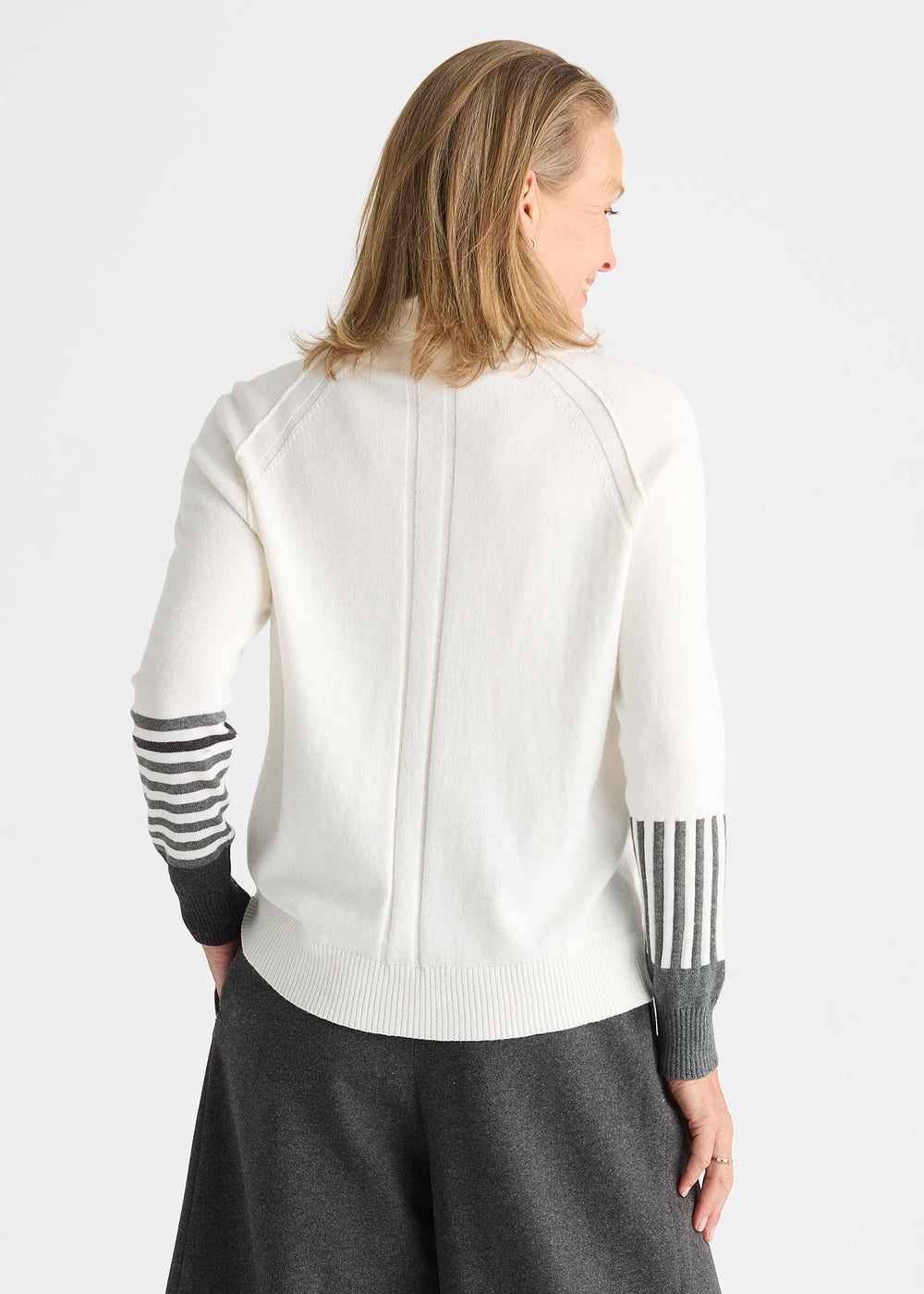 White striped drawcord sweater from Zaket & Plover, featuring a cozy top with a relaxed fit and casual style.