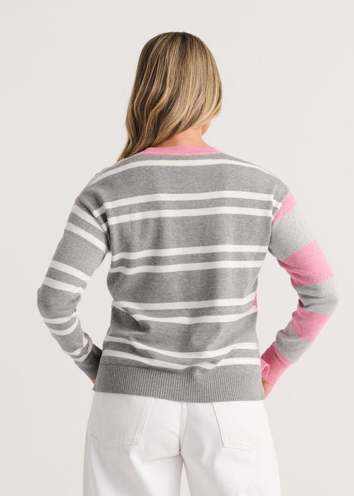 Heather pink bold stripe sweater by Zaket & Plover, featuring a cozy knit top with vibrant pink and contrasting stripes.