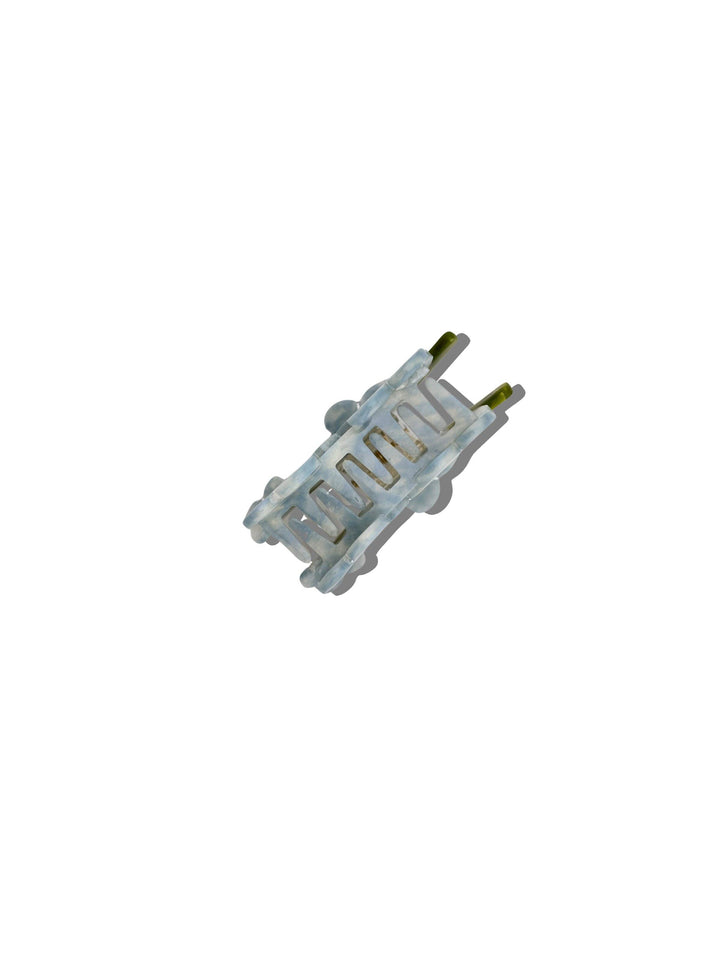 Forget Me Not Clip gift by Solar Eclipse, featuring a delicate floral design perfect for keepsakes and special occasions.