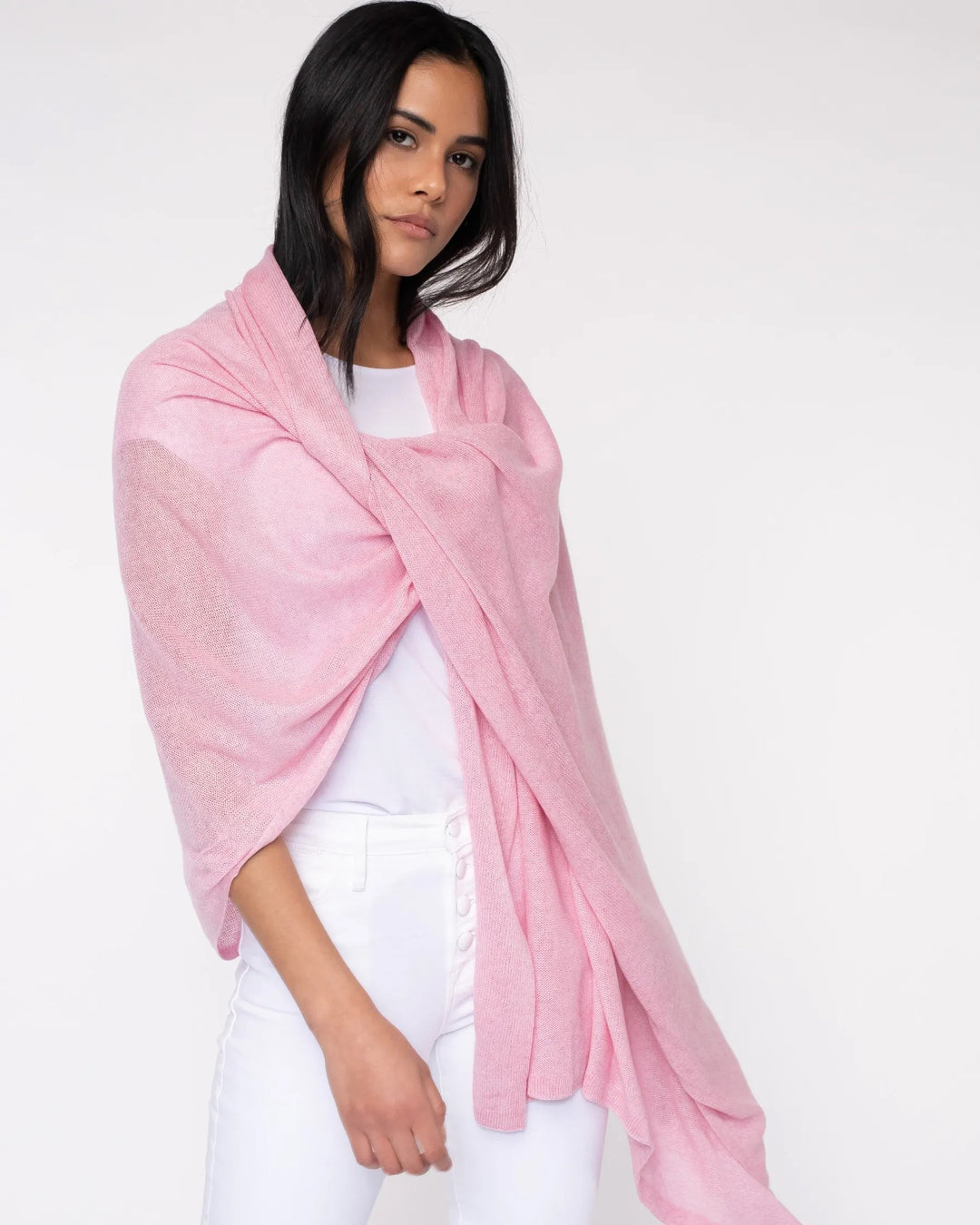 Elegant silk cashmere wrap from Alashan Cashmere in soft, luxurious fabric, draped to showcase its smooth texture and versatile style.