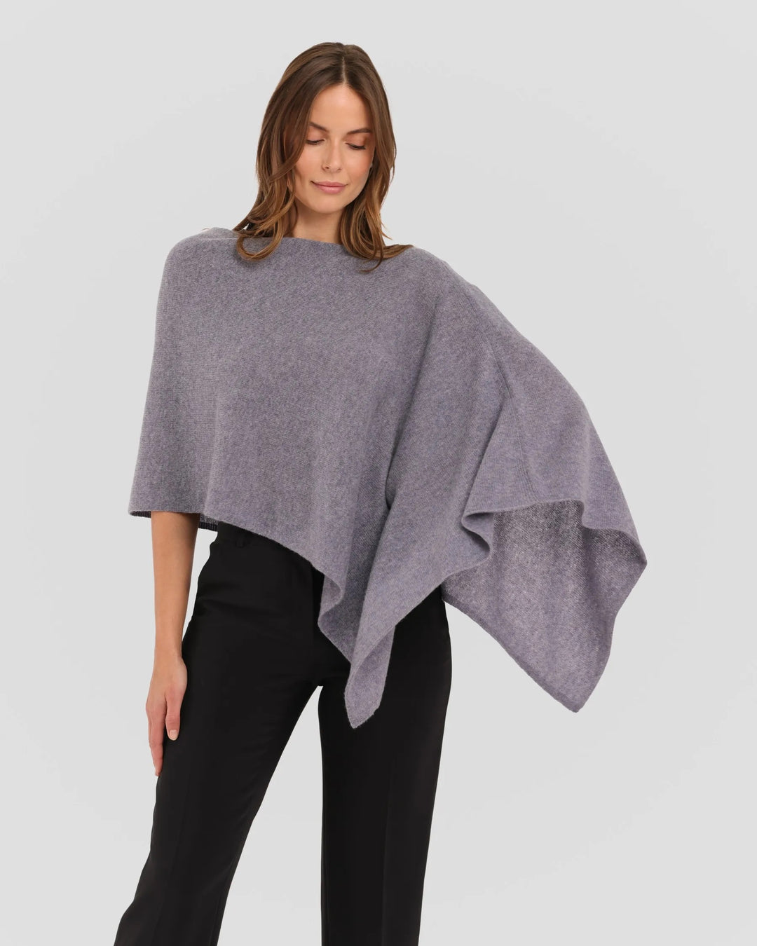 Alashan Cashmere soft cashmere topper on a hanger, lightweight and luxurious for added warmth and comfort.
