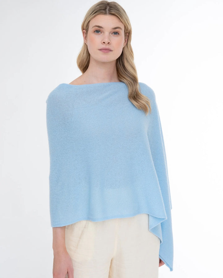 Alashan Cashmere cashmere topper tops in soft beige fabric, lightweight and cozy, displayed on a hanger.