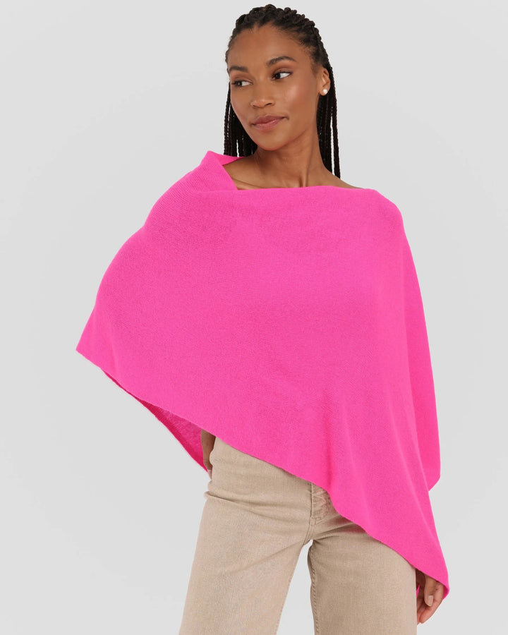 Alashan Cashmere cashmere topper in soft, luxurious fabric, draped over a neutral background for a cozy, elegant look.
