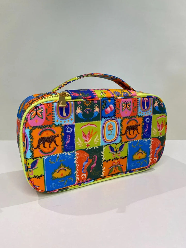 Alden Adair Nirvana makeup bag in soft fabric with a zip closure, designed as a stylish accessory for cosmetics storage.