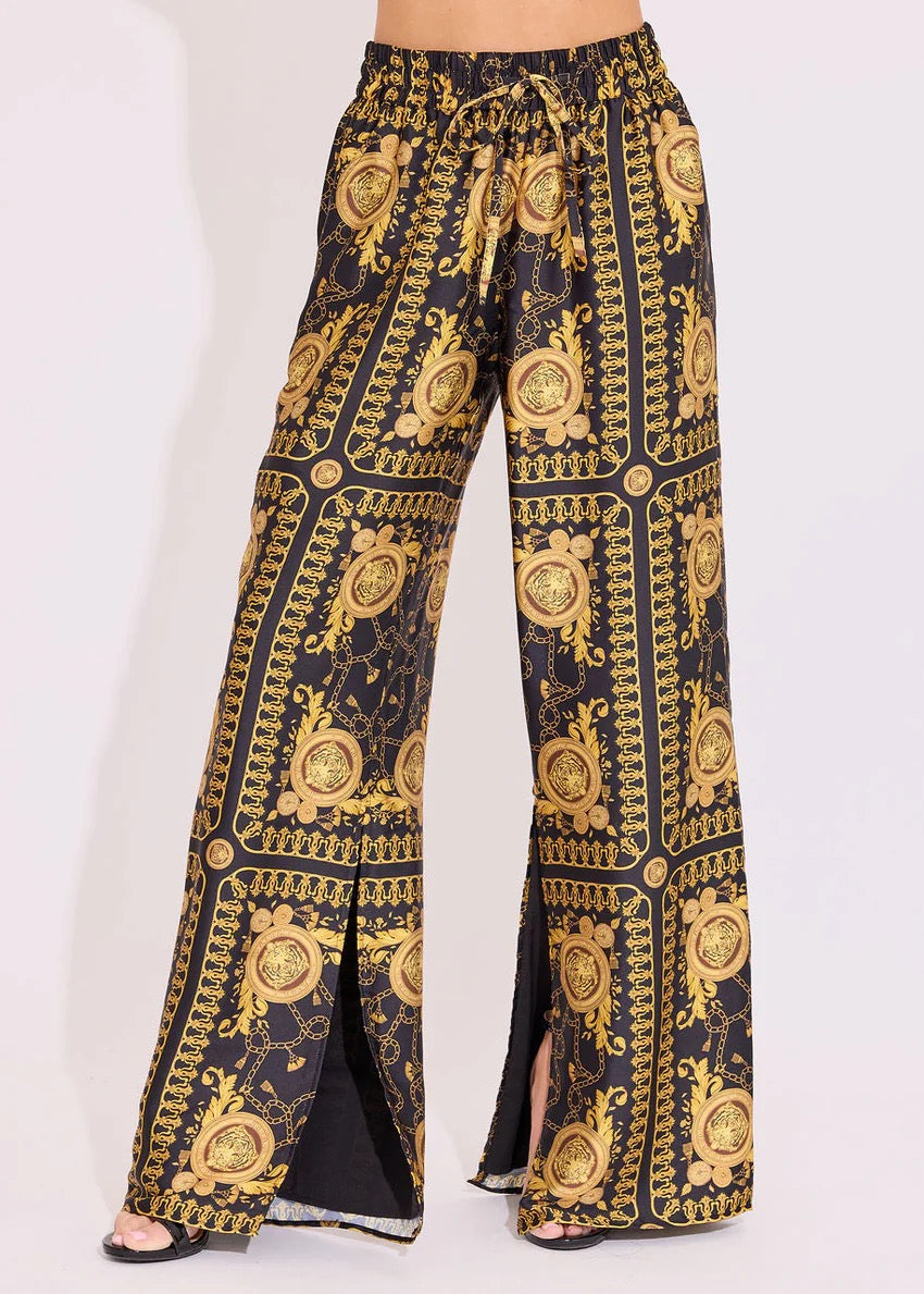 Alden Adair Donatello Penny Pant in dark denim, showing the relaxed fit and classic five-pocket design of these stylish bottoms.