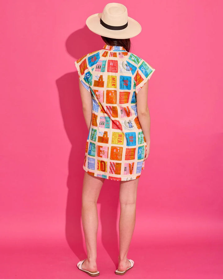Alden Adair Margot Voyage Dress displayed hanging with a relaxed fit, featuring a floral print and flowing fabric.