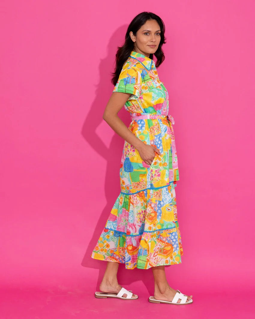 Alden Adair Rachel Van Gogh dress featuring vibrant floral patterns, sleeveless design, and knee-length cut on a mannequin.