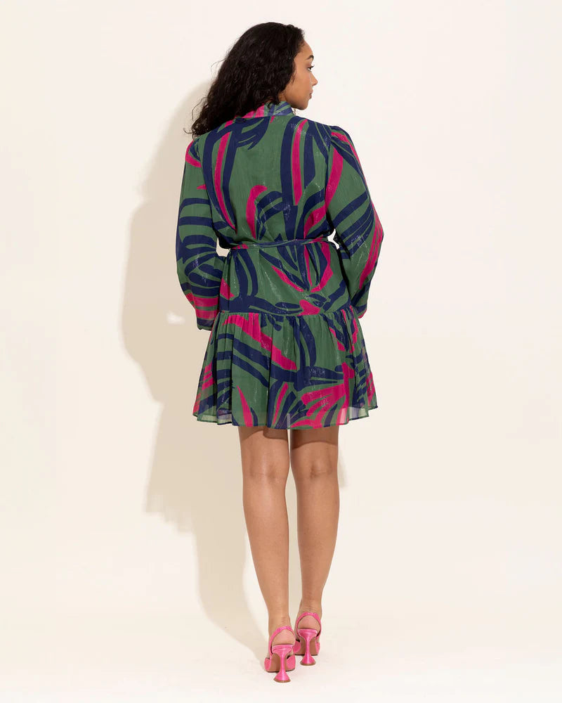 Alden Adair Adele dress displayed on a hanger, showcasing its elegant design and fabric details.