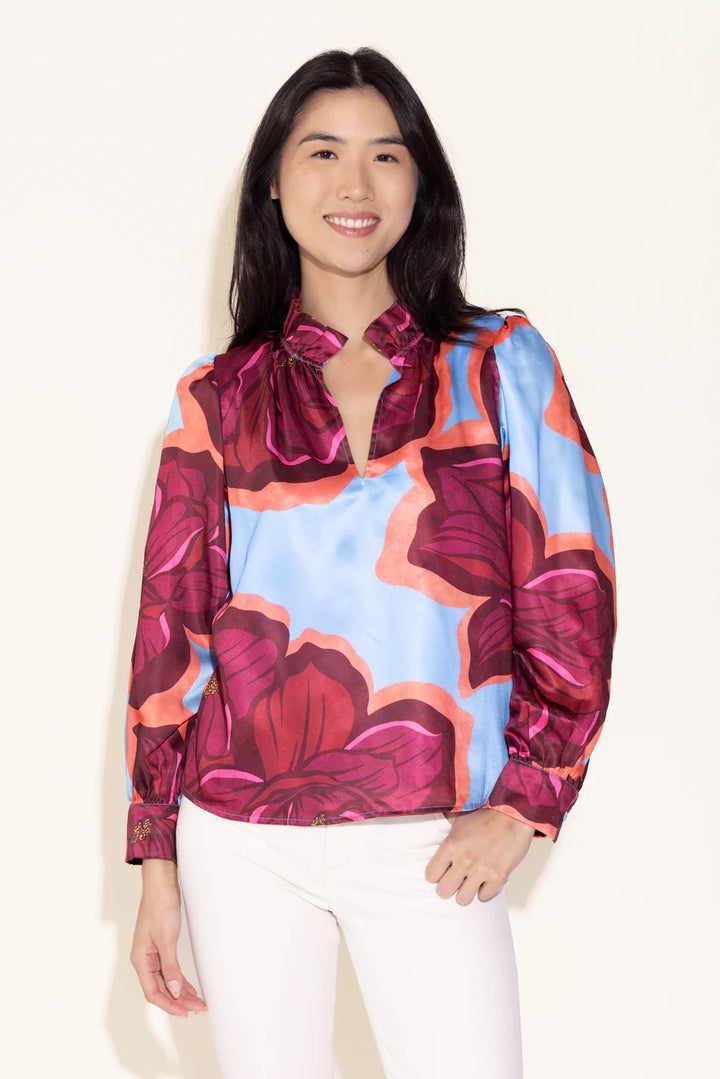 Alden Adair Phoebe Blossom Blouse, stylish women’s tops with a floral print, shown on a hanger against a neutral background.