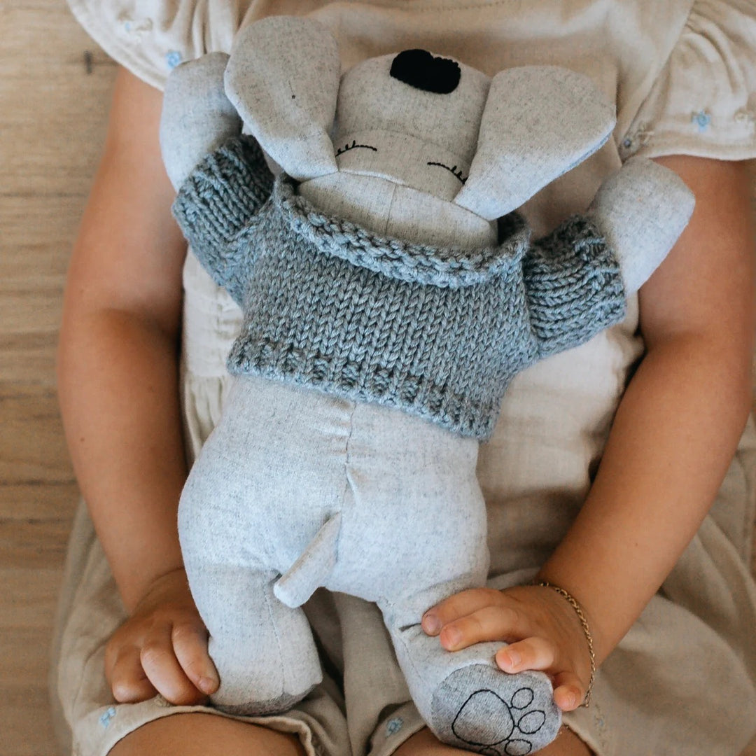 Cute Miles stuffed dog gift from And The Little Dog Laughed, plush toy with soft fur and detailed features.