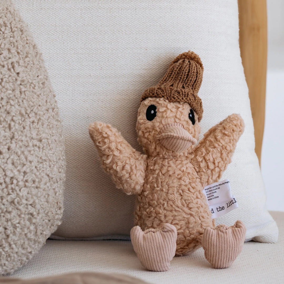 Colorful Poppy Duck toy from And The Little Dog Laughed, designed as a gift, with soft fabric and a cute duck shape.