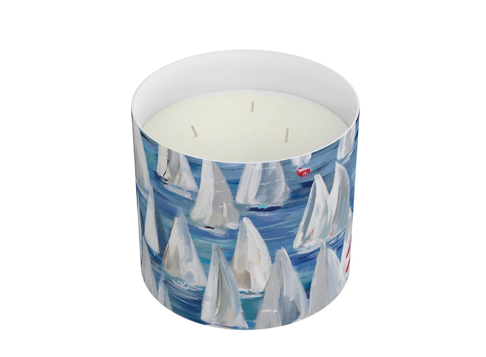 Annapolis Candle 3-wick home candle with a white ceramic holder and a lit wick, perfect for cozy home decor and ambiance.