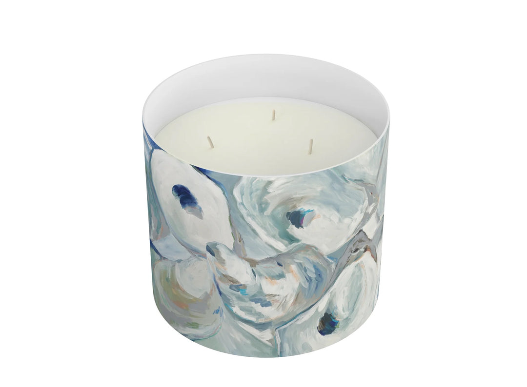 Annapolis Candle 3-wick home candle with a glass jar and white wax, showcasing a warm, inviting ambiance.