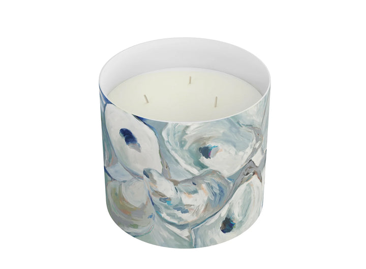 Annapolis Candle 3-wick home candle with a glass jar and white wax, showcasing a warm, inviting ambiance.