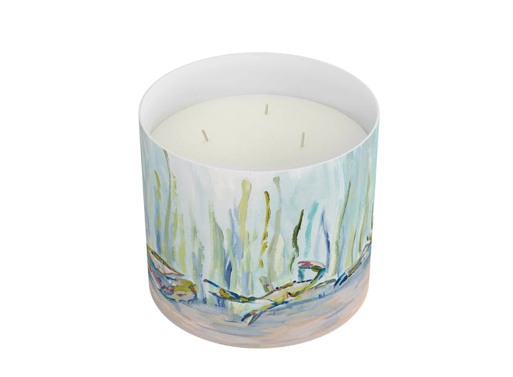 Annapolis Candle 3-wick home candle with a glass jar and lit wick, showcasing warm, inviting ambiance.