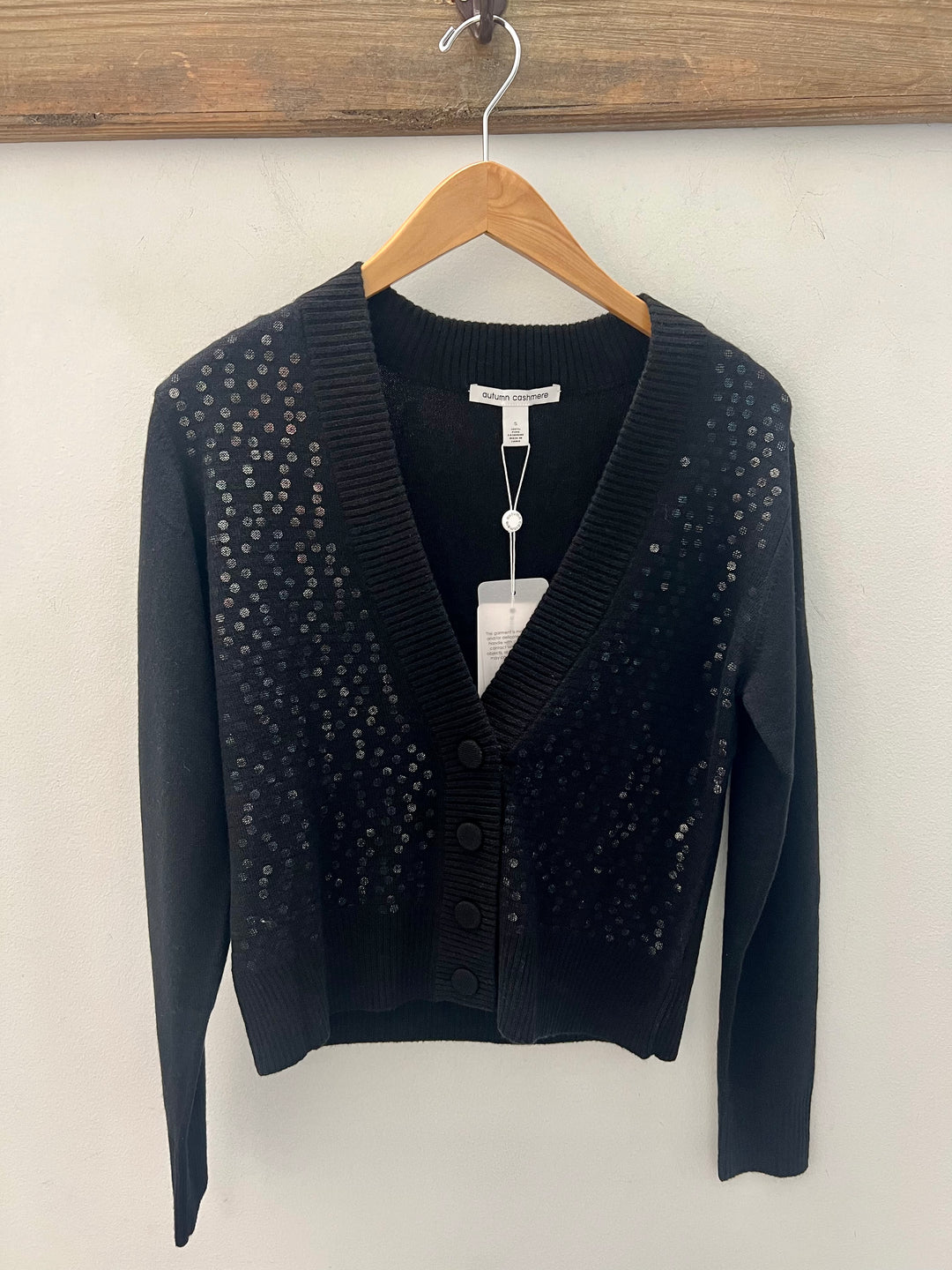 Sheer illusion cardigan from Autumn Cashmere, lightweight and transparent tops with delicate knit fabric, displayed on a neutral background.