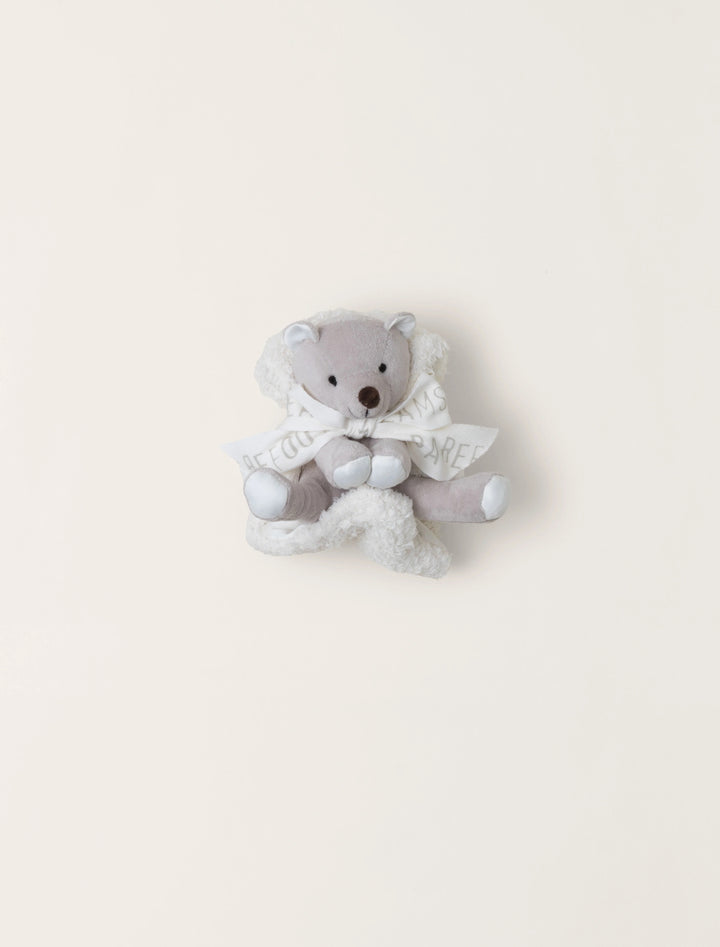 Barefoot Buddie baby sock slippers from Barefoot Dreams, soft fabric with a cozy design for little feet.