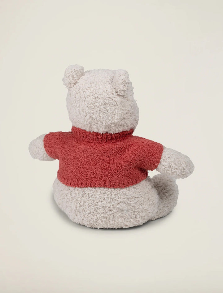 Soft Winnie the Pooh baby stuffed animal by Barefoot Dreams, plush and cuddly toy for infants, with detailed embroidered features.
