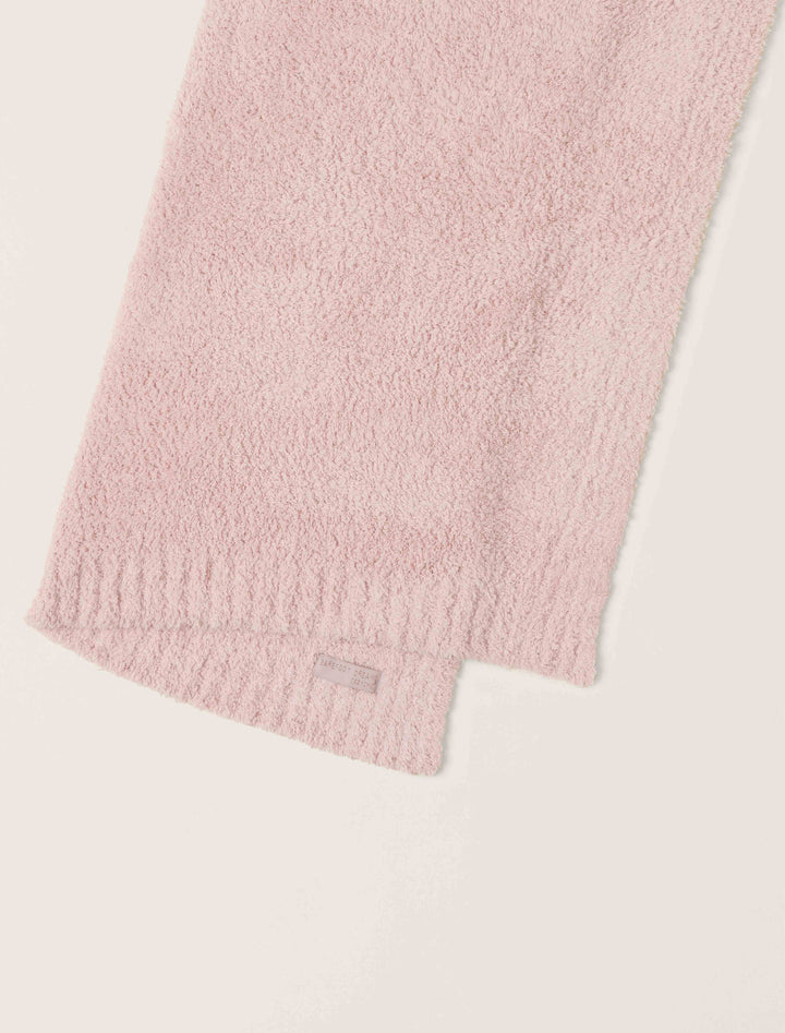 Barefoot Dreams CozyChic baby stroller blanket in soft, plush fabric, perfect for keeping a baby warm during outings.