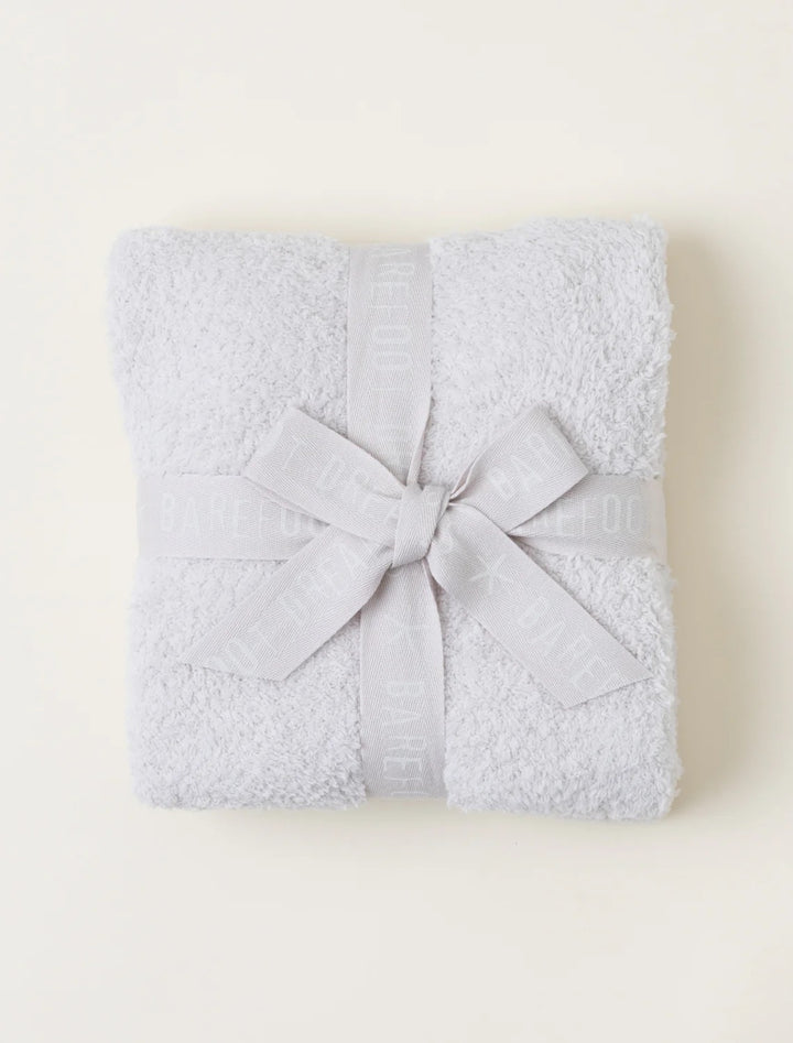 Barefoot Dreams CozyChic baby stroller blanket in soft, cozy knit fabric, perfect for keeping your little one warm.