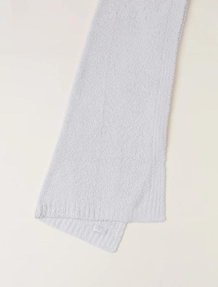 Barefoot Dreams CozyChic baby stroller blanket in soft, plush fabric, perfect for keeping your little one warm and comfortable.