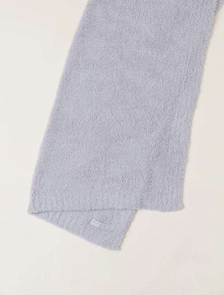 Barefoot Dreams CozyChic baby stroller blanket in soft, plush fabric with a neutral color, perfect for keeping infants warm and comfortable.
