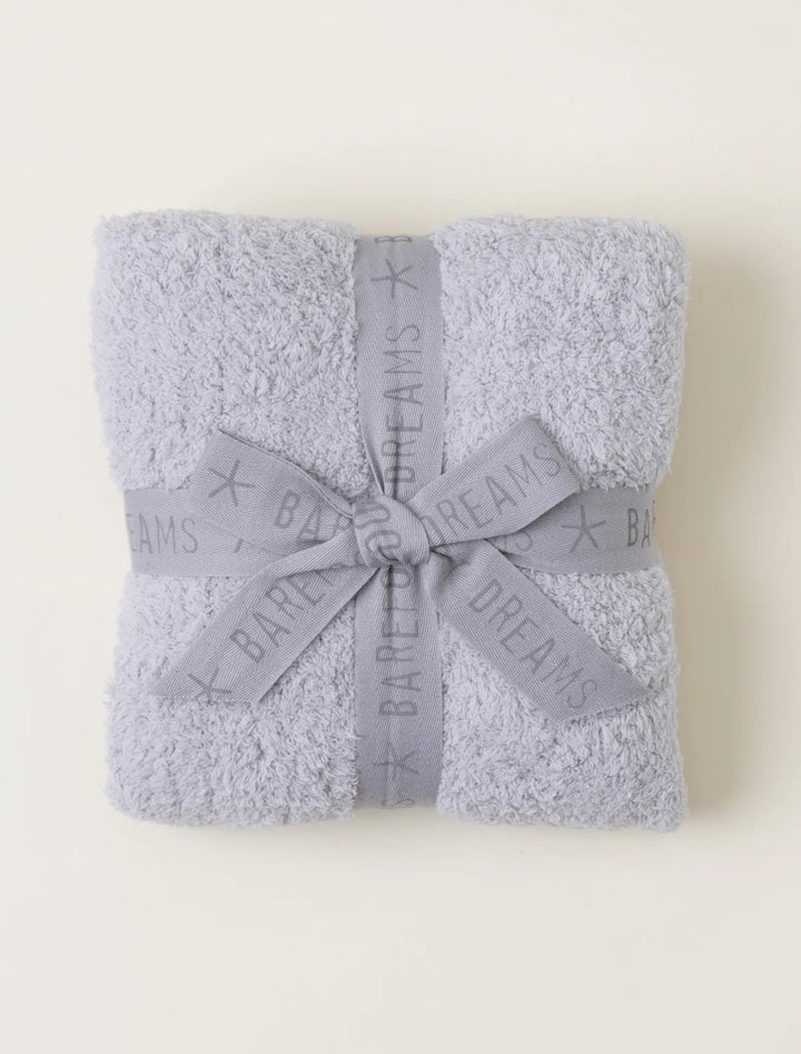 Barefoot Dreams CozyChic baby stroller blanket in soft, plush fabric, perfect for keeping your little one warm and comfortable.