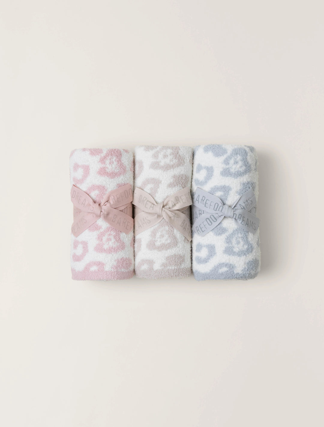 Barefoot Dreams In The Wild baby blanket gift with soft, cozy fabric, featuring a nature-inspired pattern.