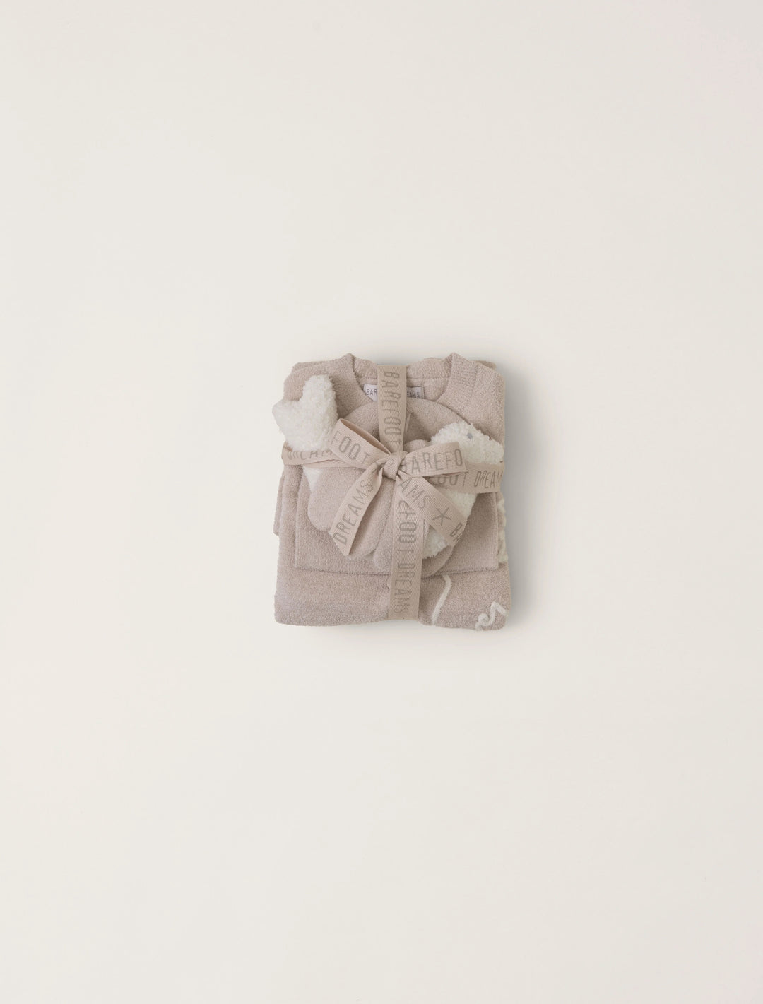 Barefoot Dreams Covered In Prayer onesie gift with soft fabric and prayer-themed design, perfect for newborns or special occasions.