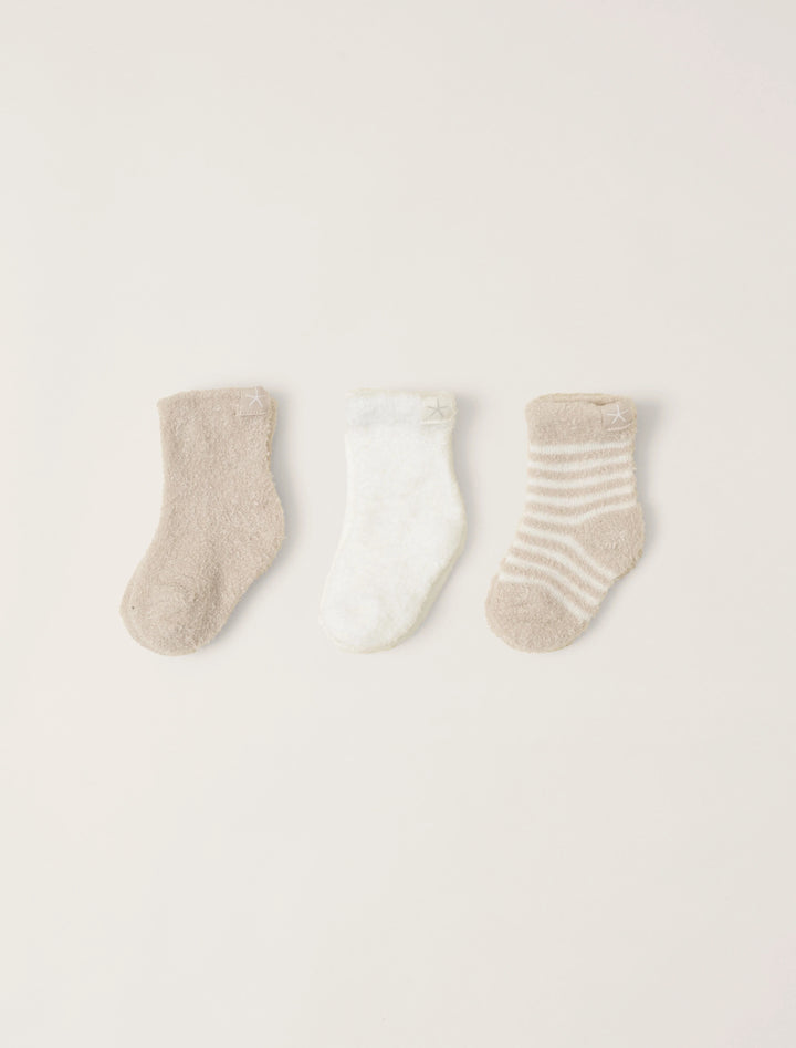 Soft barefoot dreams infant socks 3-pack with colorful patterns, perfect for gift-giving and keeping tiny feet warm.
