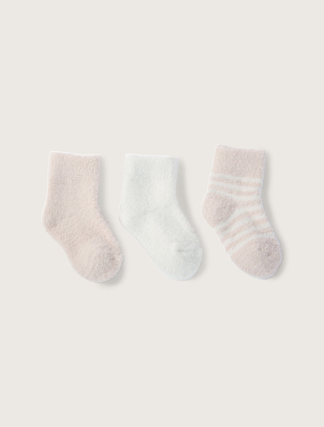 Barefoot Dreams infant socks 3-pack with soft, cozy designs perfect for babies, ideal as gifts for new parents.