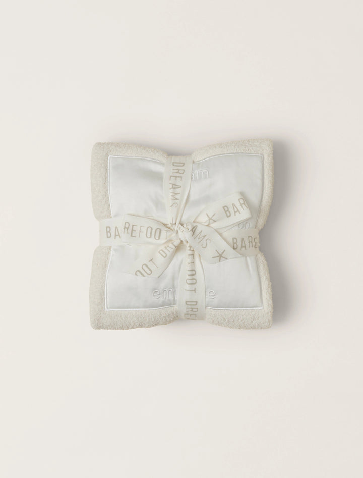 Barefoot Dreams satin trim receiving blanket, soft and luxurious gift for newborns, with delicate satin edging and cozy fabric.