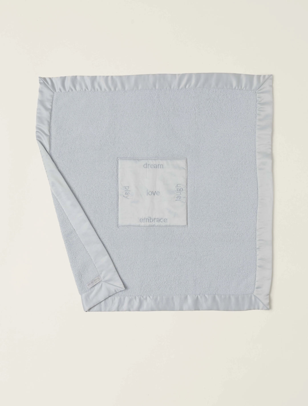 Barefoot Dreams satin trim receiving blanket with soft, luxurious fabric and delicate satin edging for newborn gift.