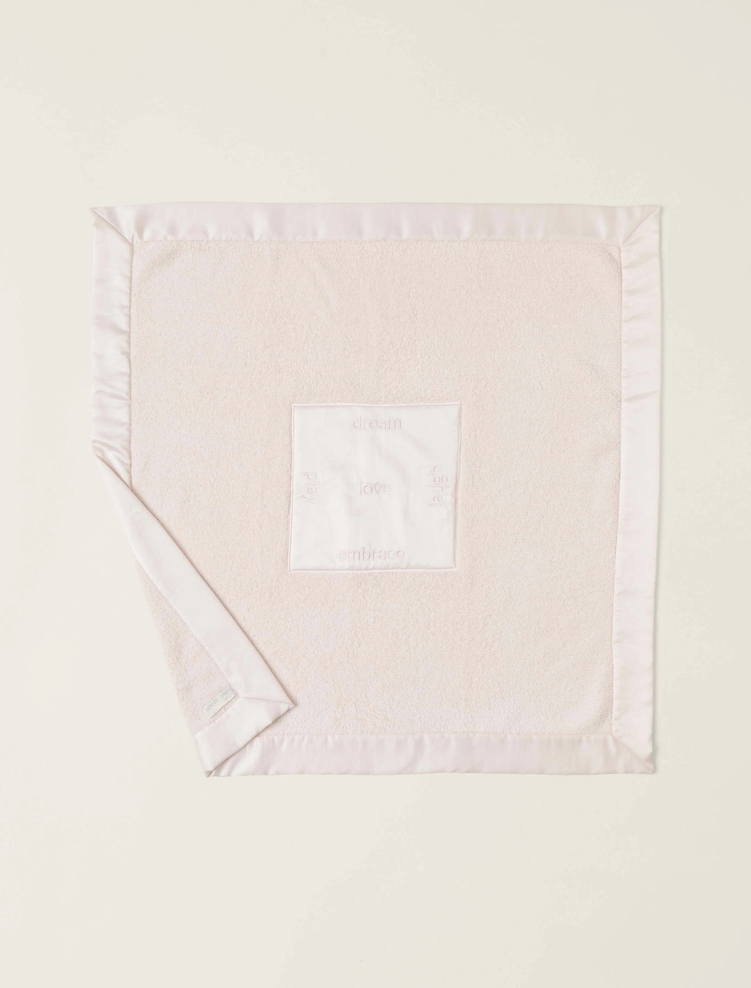 Barefoot Dreams satin trim receiving blanket with soft fabric, featuring elegant satin edging, perfect for gifting to a newborn.