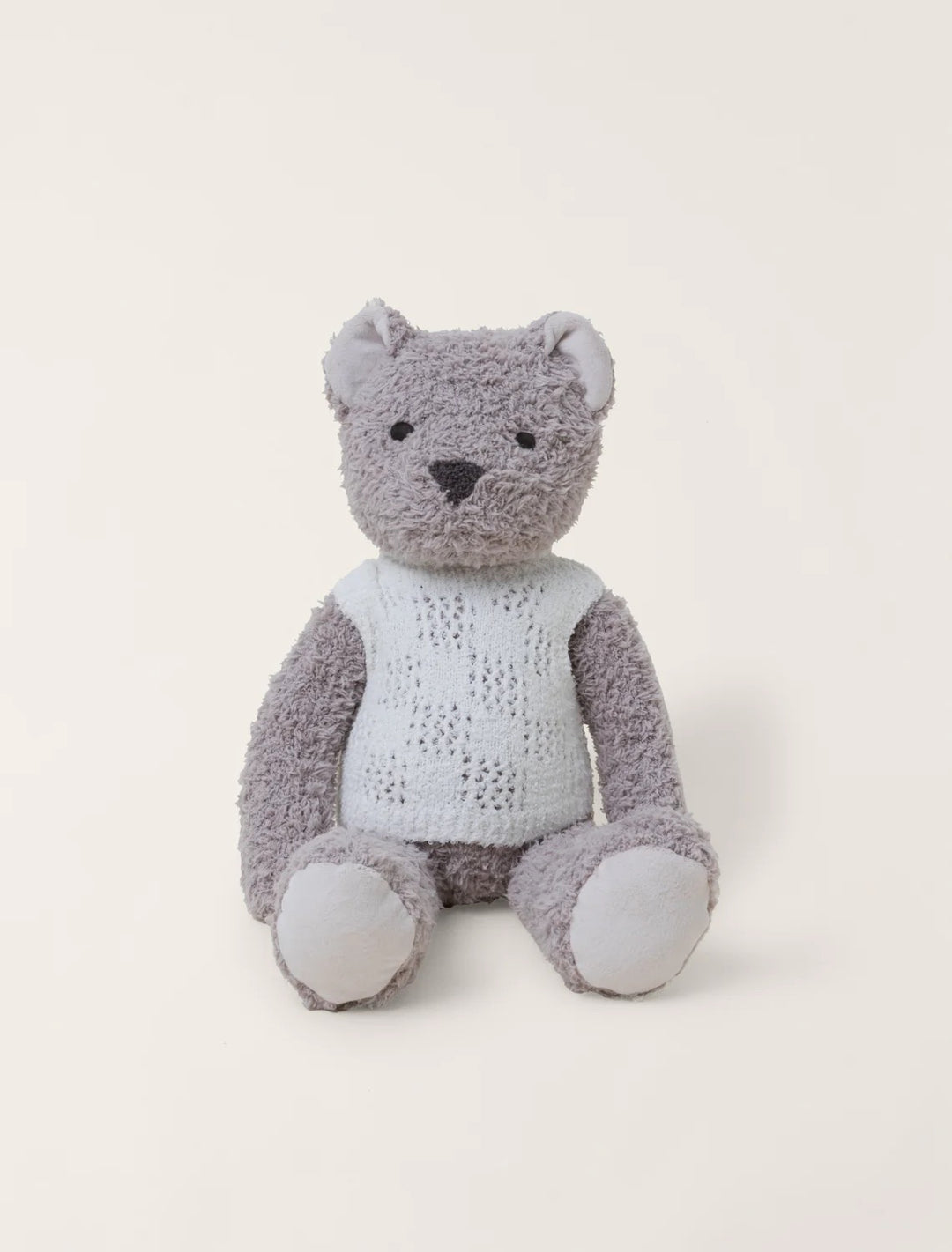 Barefoot Dreams Bear Buddie wearing a cozy vest, perfect gift for children, soft plush toy with detailed clothing.