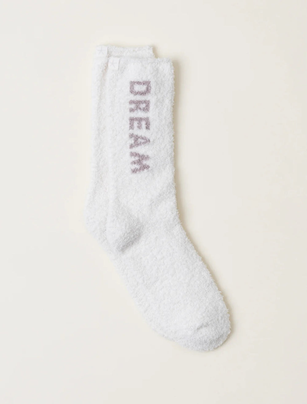 Barefoot Dreams gift socks displayed on a cozy surface, featuring soft knit fabric and stylish design for comfortable wear.