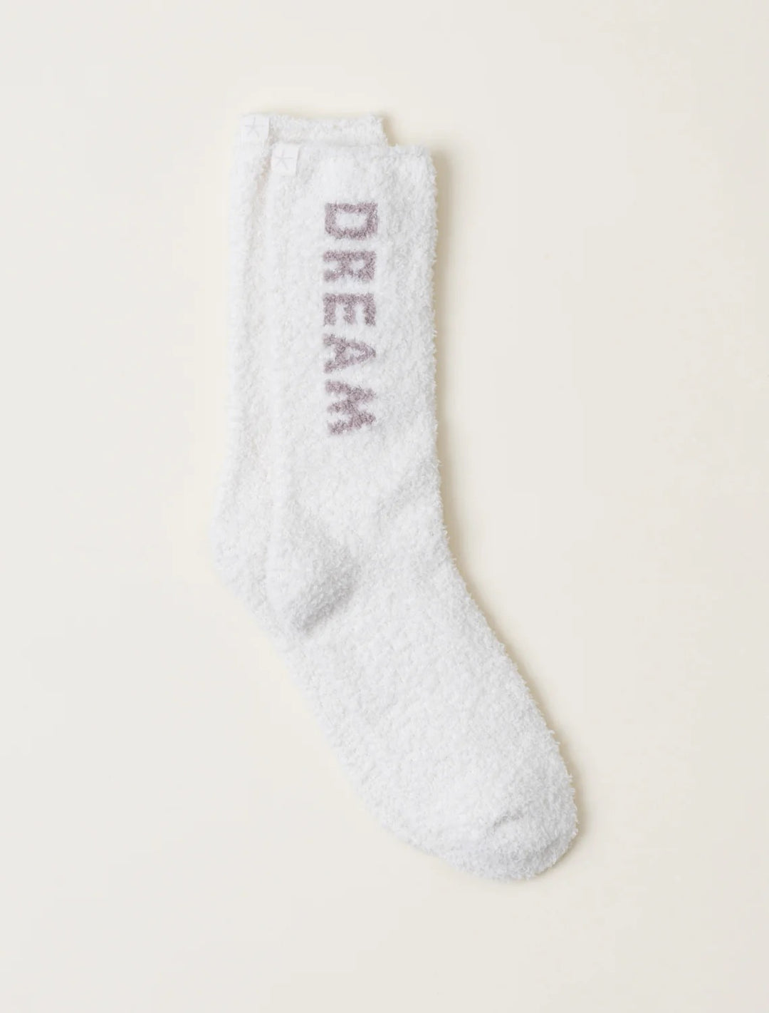 Barefoot Dreams gift socks displayed on a cozy surface, featuring soft knit fabric and stylish design for comfortable wear.