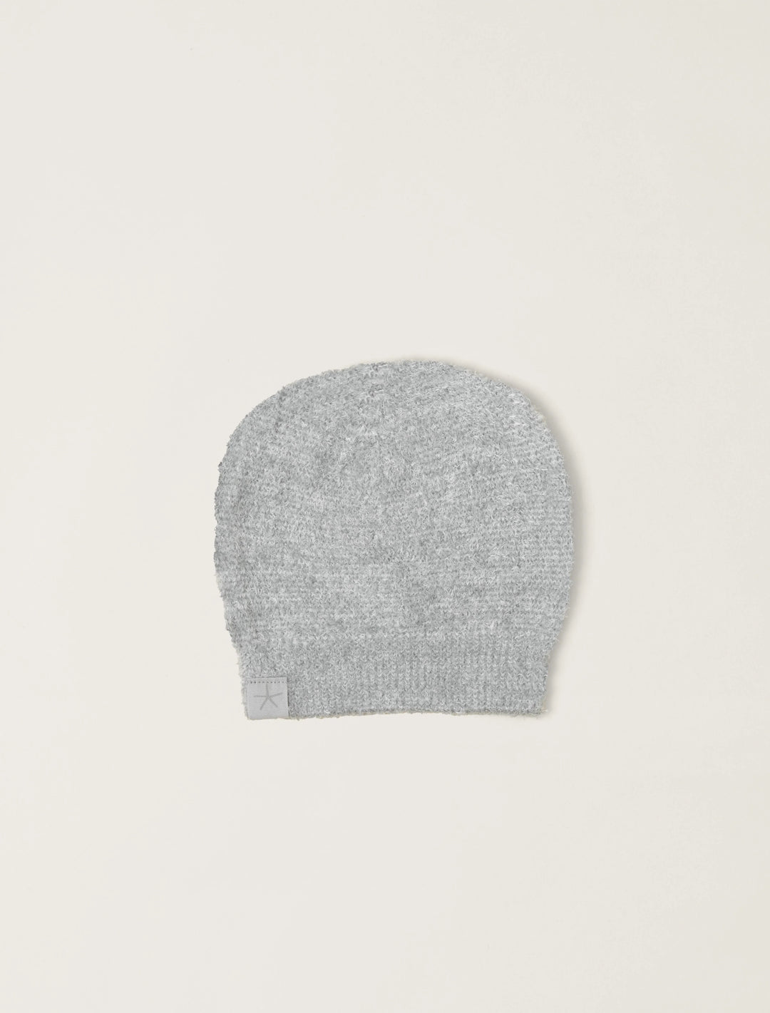 Soft beige Cozy Infant Beanie by Barefoot Dreams, gently folded with a cozy knit texture suitable for gift-giving.