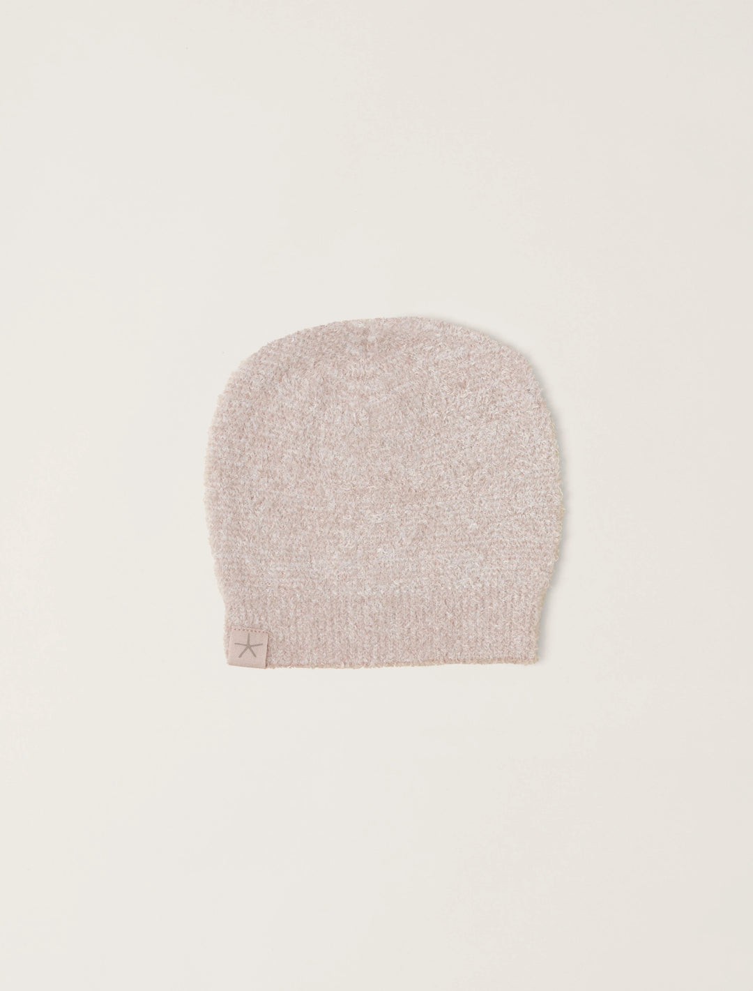 Soft beige barefoot dreams cozy infant beanie with a folded brim, perfect for keeping a baby's head warm and comfortable.
