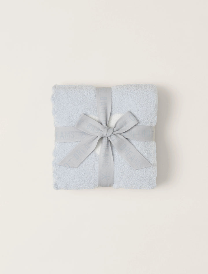 Soft barefoot dreams cuddle receiving blanket for gifts, featuring plush fabric and cozy design for comfort and warmth.