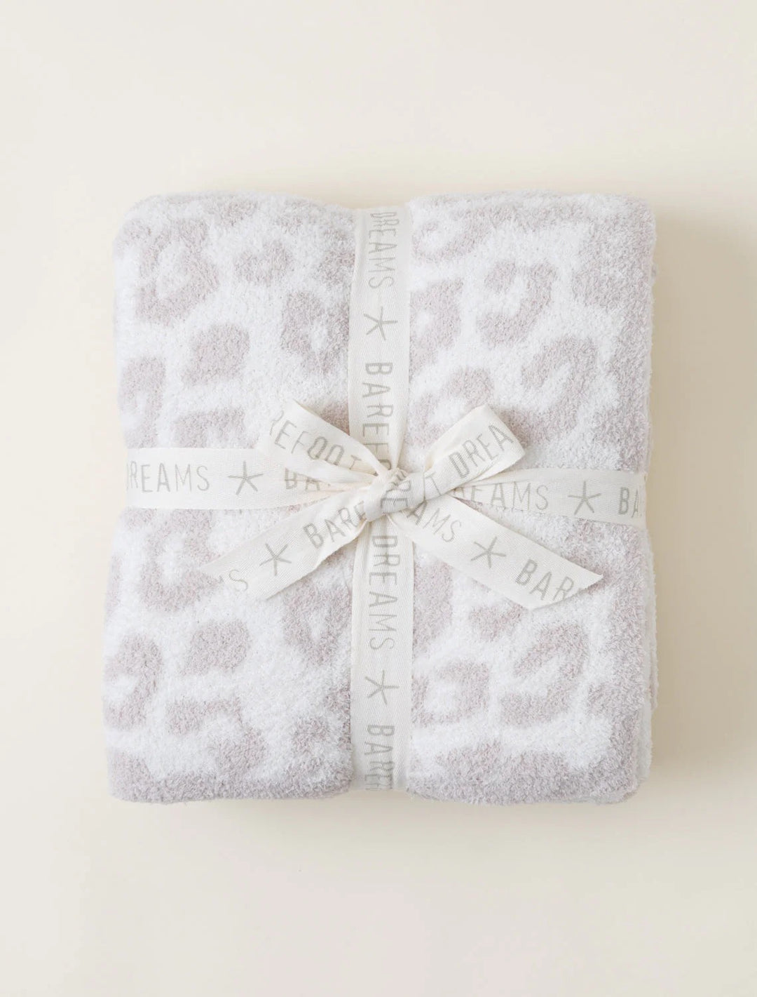 Barefoot in the Wild Throw by Barefoot Dreams, soft cozy home blanket with nature-inspired pattern, perfect for lounging and relaxing.
