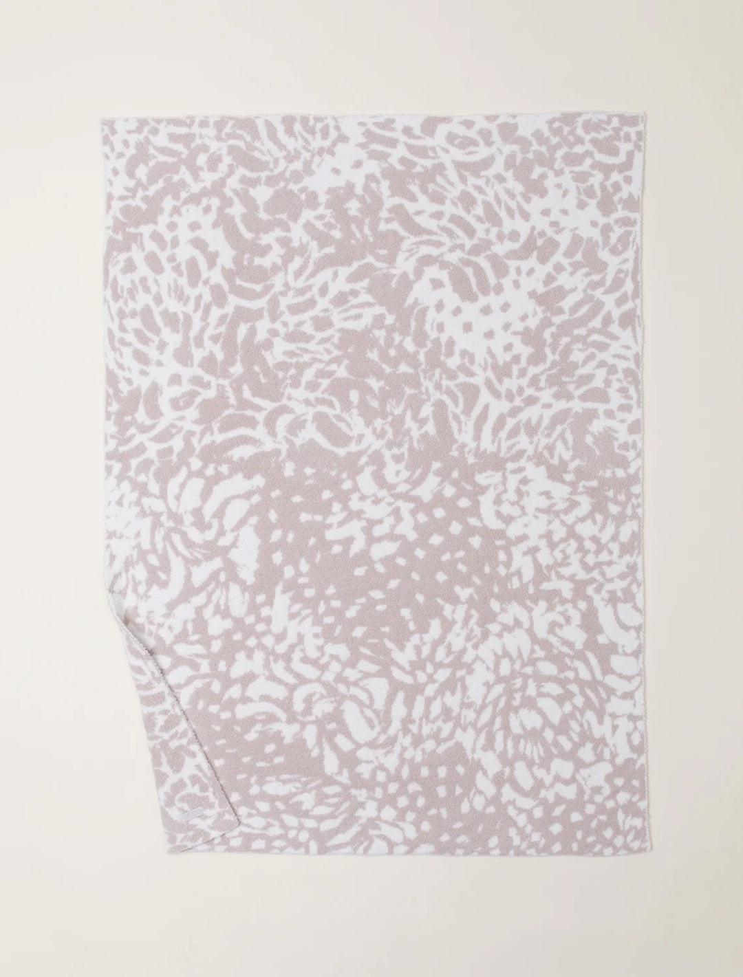 Soft Barefoot Dreams Blooms Blanket with floral pattern, cozy home decor throw in plush, luxurious fabric.