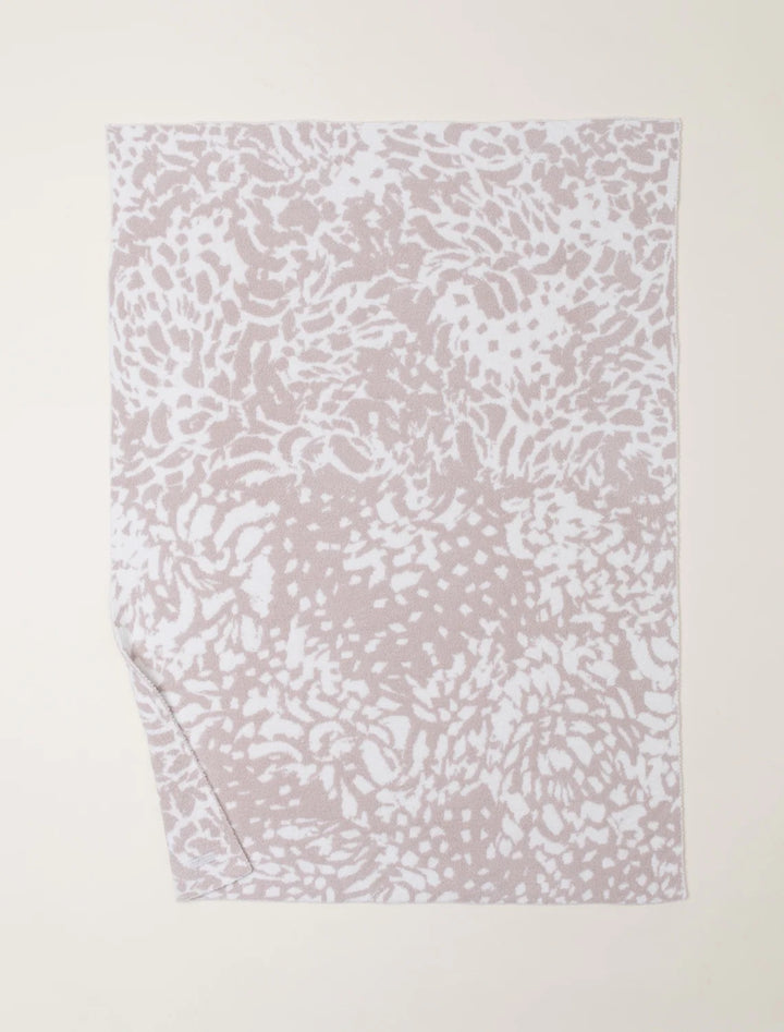 Soft Barefoot Dreams Blooms Blanket with floral pattern, cozy home decor throw in plush, luxurious fabric.