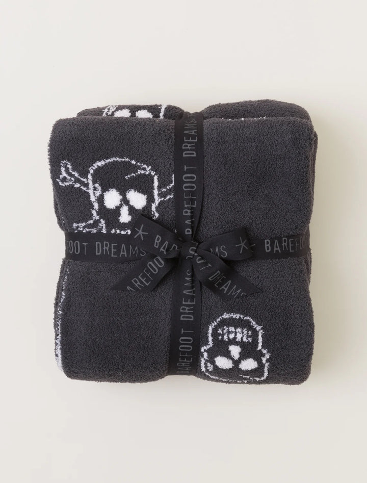 Barefoot Dreams Cozy Chic Skull throw blanket with soft knit fabric and stylish skull design for cozy home decor.