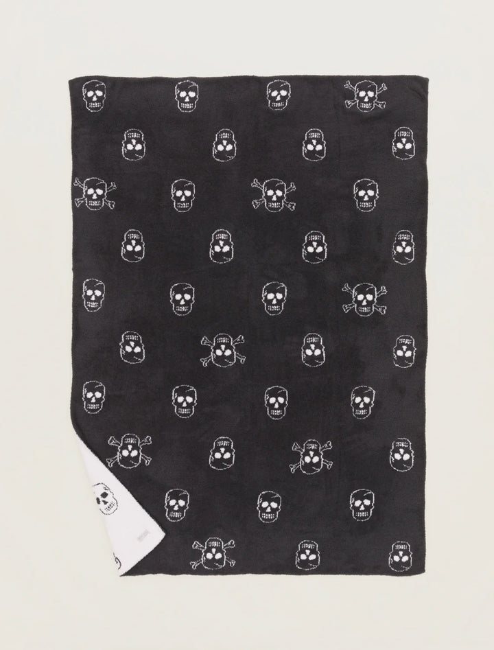 Barefoot Dreams Cozy Chic Skull throw blanket with a soft, plush texture and a stylish skull design for home decor.