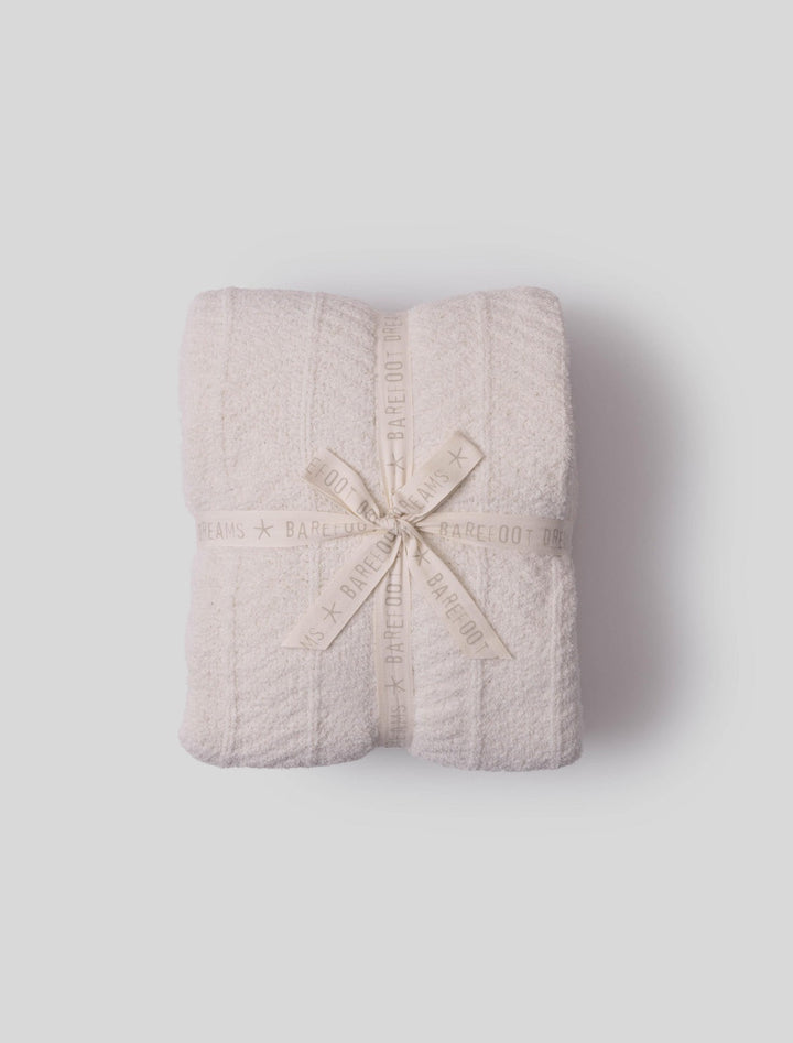 Barefoot Dreams Cozy Herringbone Bed Blanket in soft, textured fabric for luxurious home comfort and stylish bedroom decor.