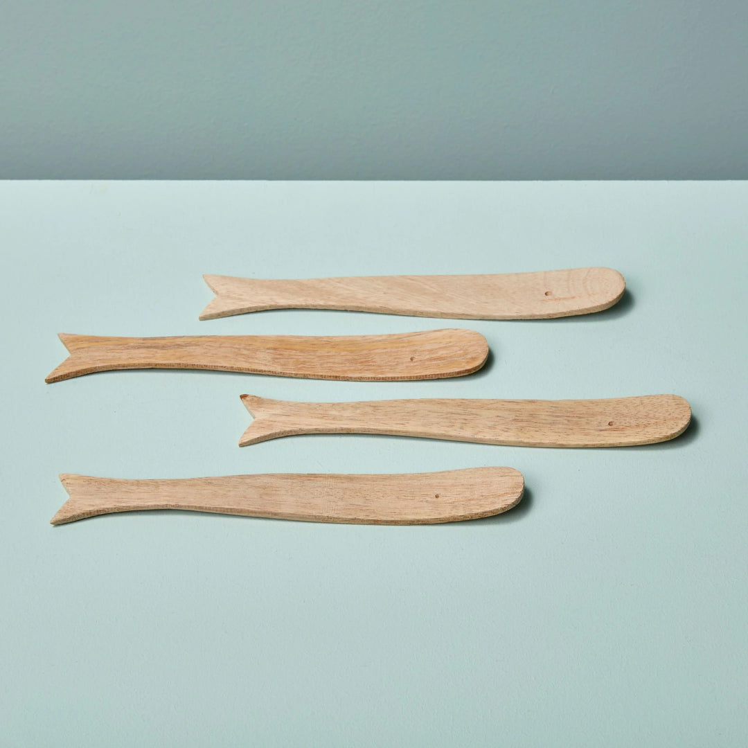 Be Home whale-shaped spreaders for home use, featuring sleek design and stainless steel material, perfect for serving condiments.