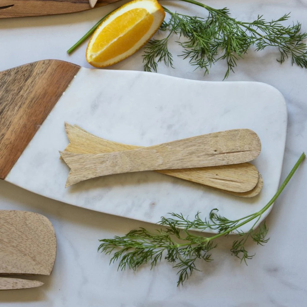 Decorative whale-shaped spreaders for home tableware by Be Home, featuring detailed whale design in a natural setting.