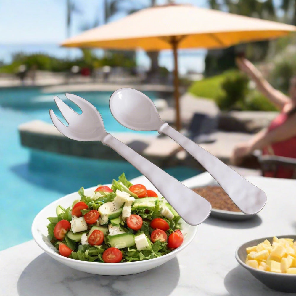 Beatriz Ball Vida Havana large salad servers set for the home, featuring elegant design and durable stainless steel construction.