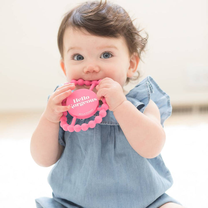 Bella Tunno Hello Gorgeous Happy Baby Teether with colorful silicone and textured surface for soothing baby gums.